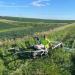 Agronomy student Molly Blum with a drone.