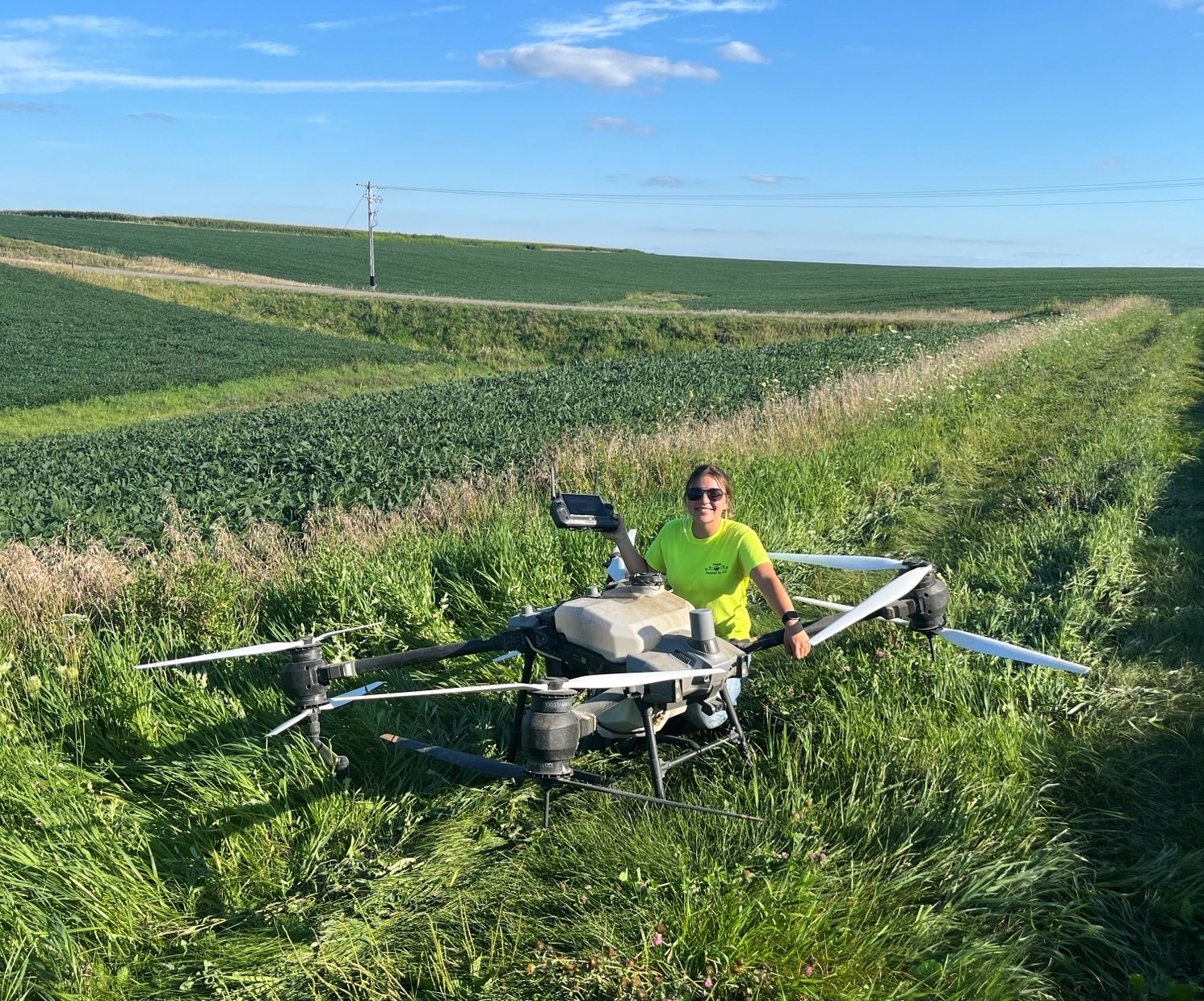 Agronomy student Molly Blum with a drone.