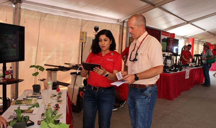 Arti Singh, agronomy, with Iowa Secretary of Agriculture Mike Naig.