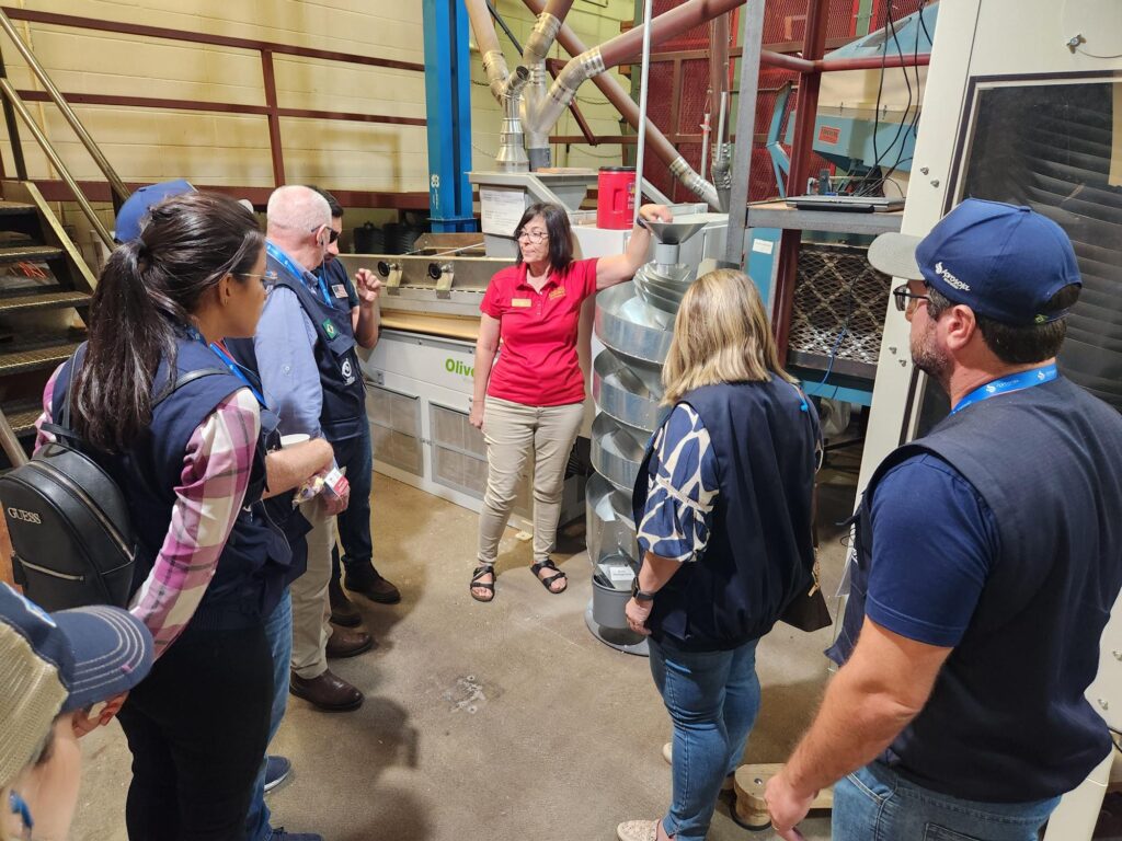 Susana Goggi, agronomy, assists with a tour of Seed Science.